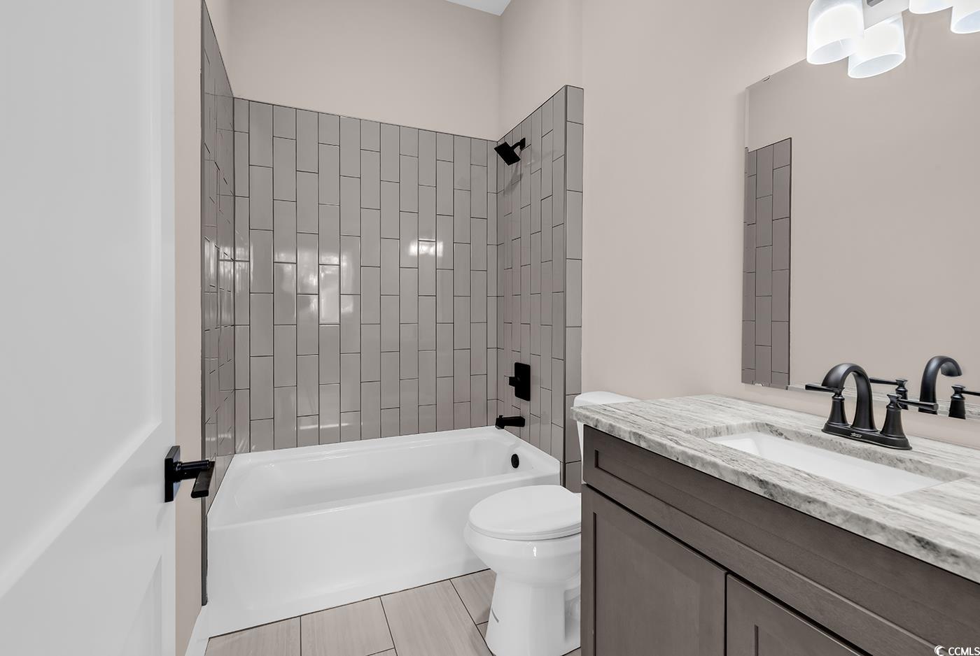 535 Mary Lou Avenue Murrells Inlet, SC 29576 - Photo 23 of 30 Bathroom with shower / bath combination and vanity