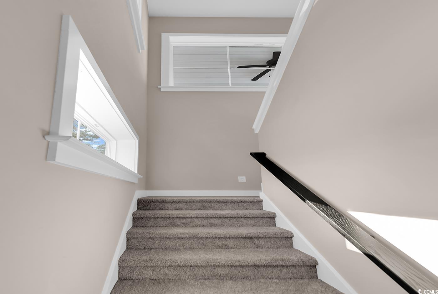 535 Mary Lou Avenue Murrells Inlet, SC 29576 - Photo 25 of 30 Staircase featuring windows.