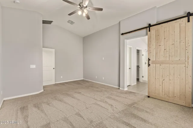 a spacious bathroom with a tub sink shower and mirror