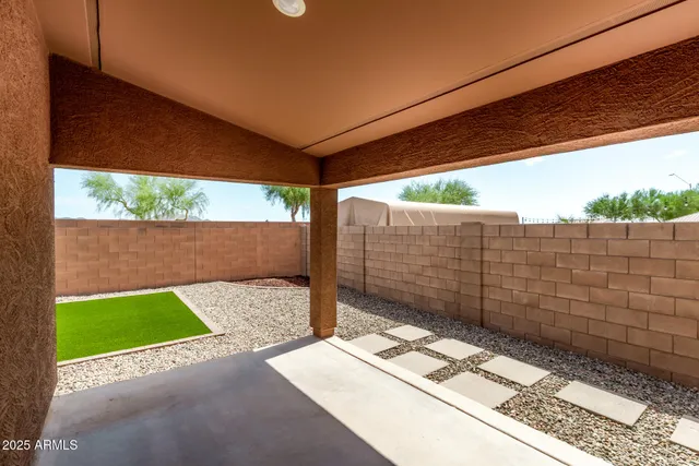 a house view with a backyard space