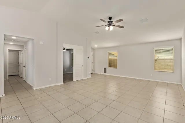 a view of an empty room and window