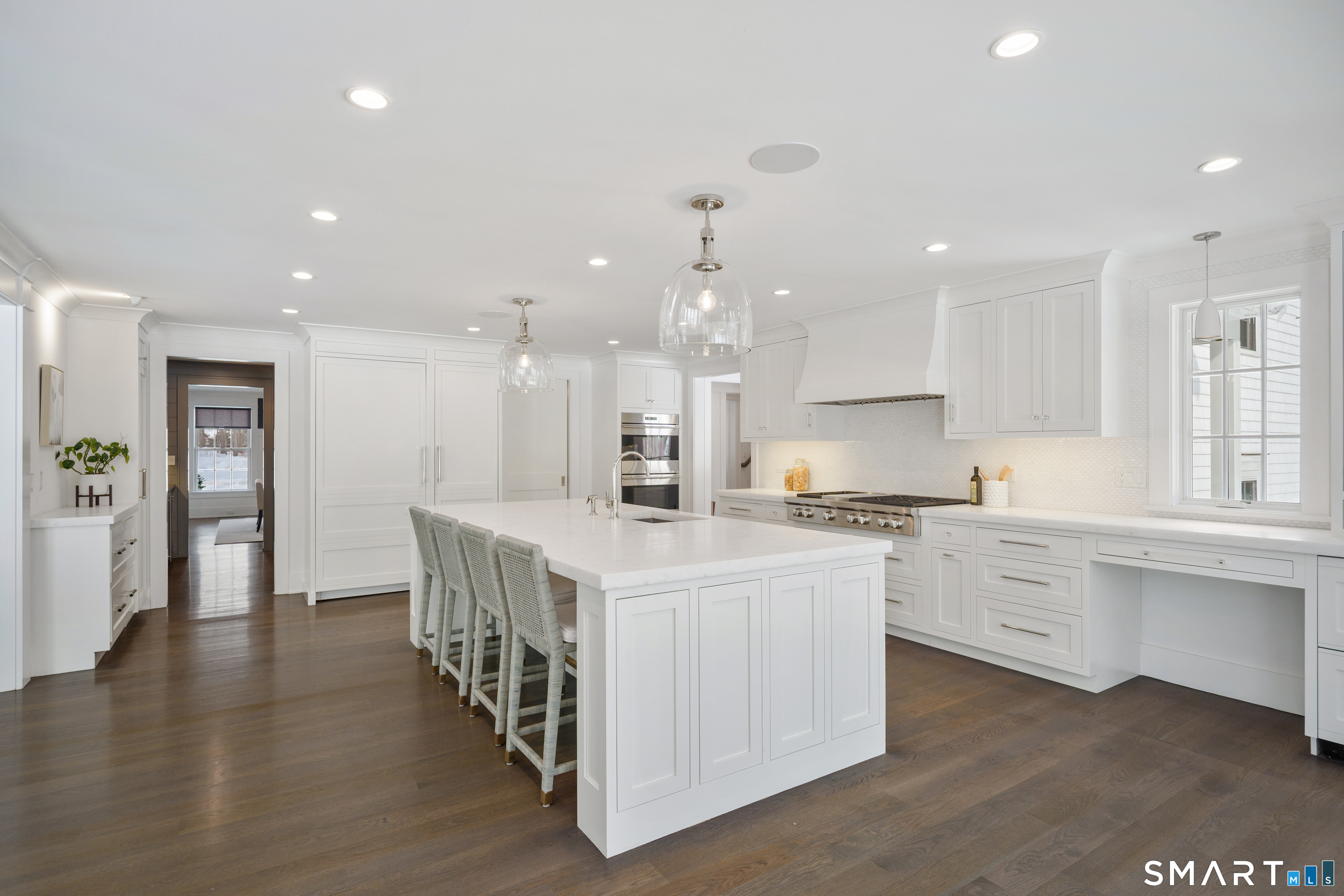15 Marianne Road Darien, CT 06820 - Photo 17 of 36 a kitchen with kitchen island a sink and a stove in it