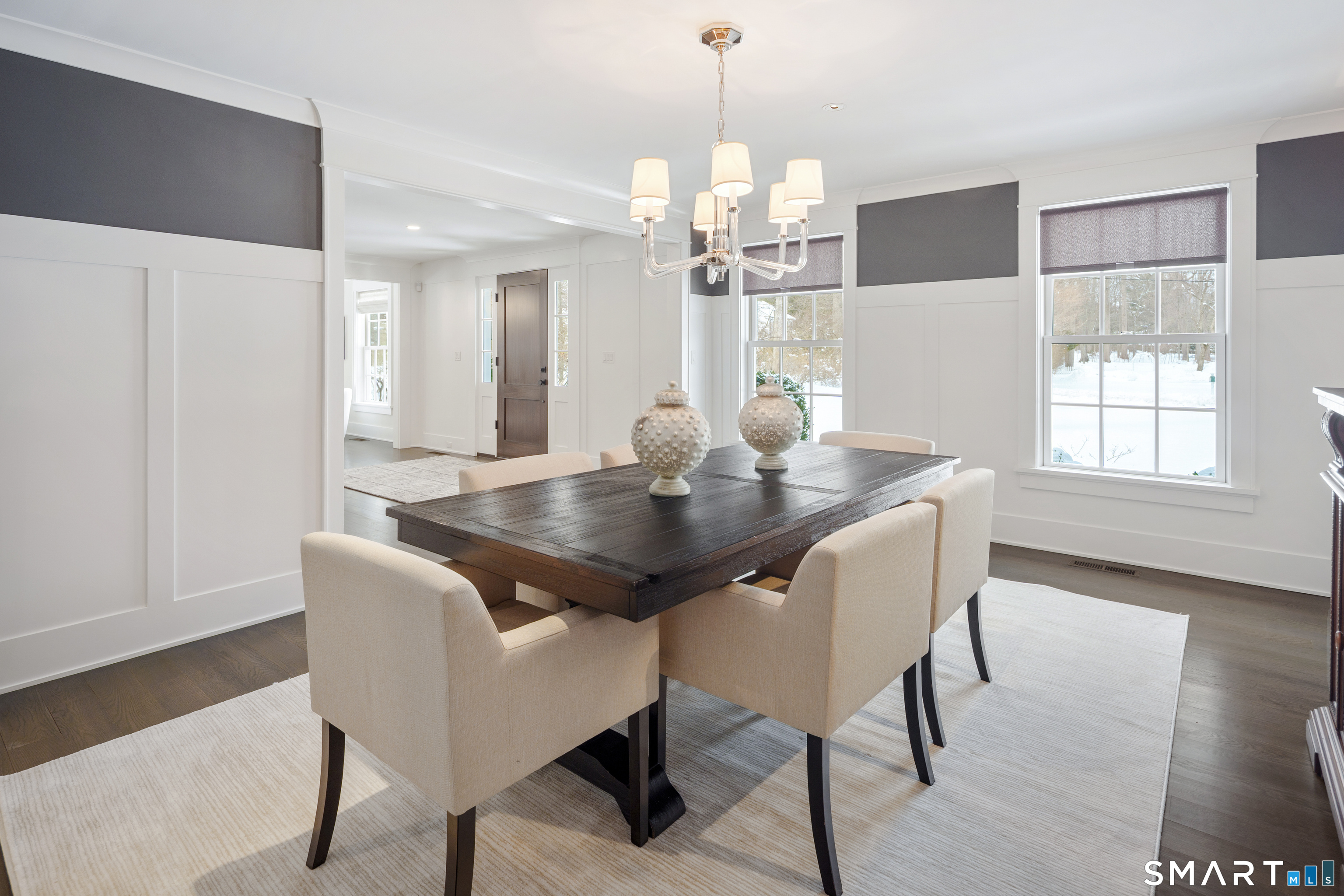 15 Marianne Road Darien, CT 06820 - Photo 21 of 36 a view of a dining room with furniture window and wooden floor