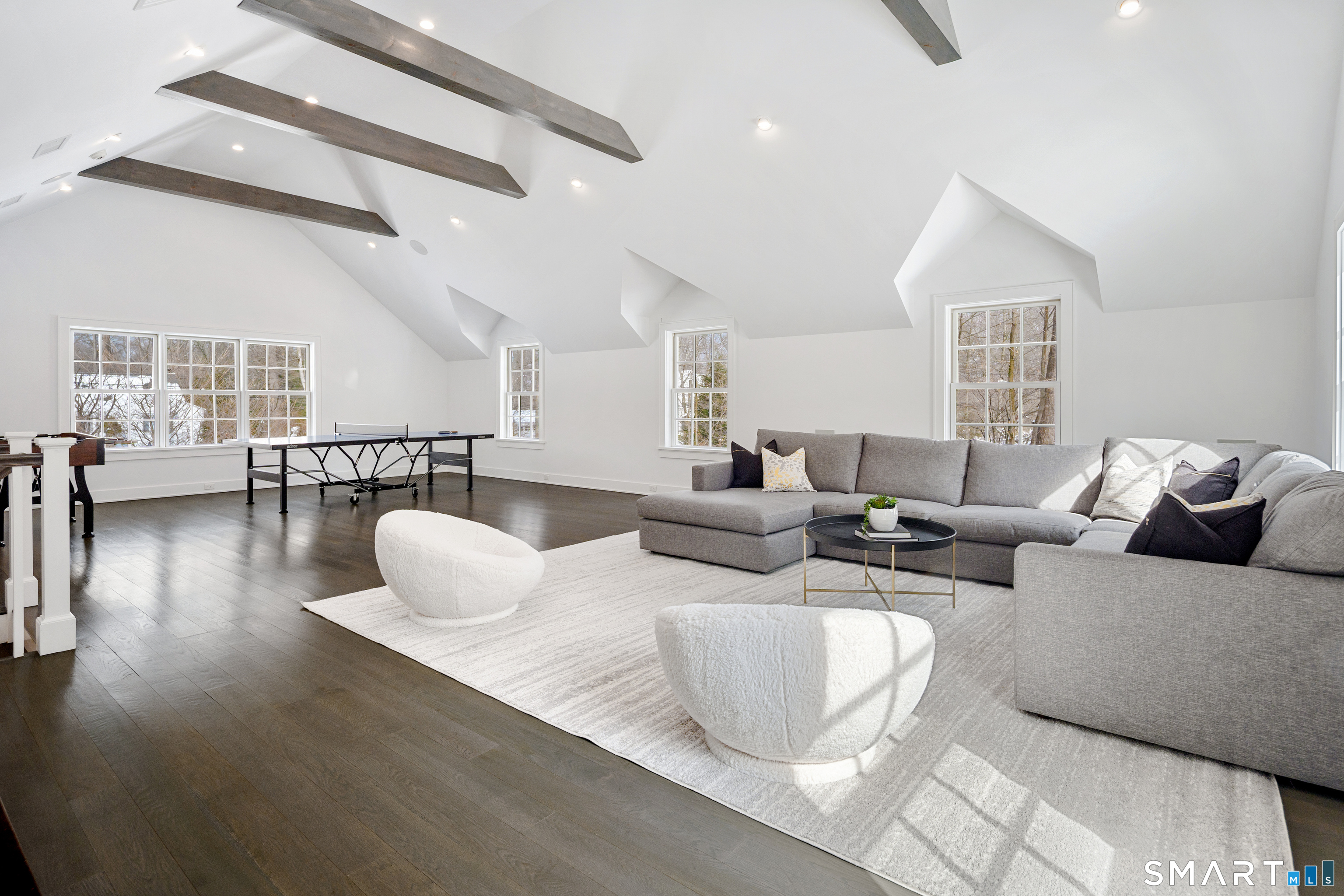 15 Marianne Road Darien, CT 06820 - Photo 25 of 36 a living room with furniture and wooden floor
