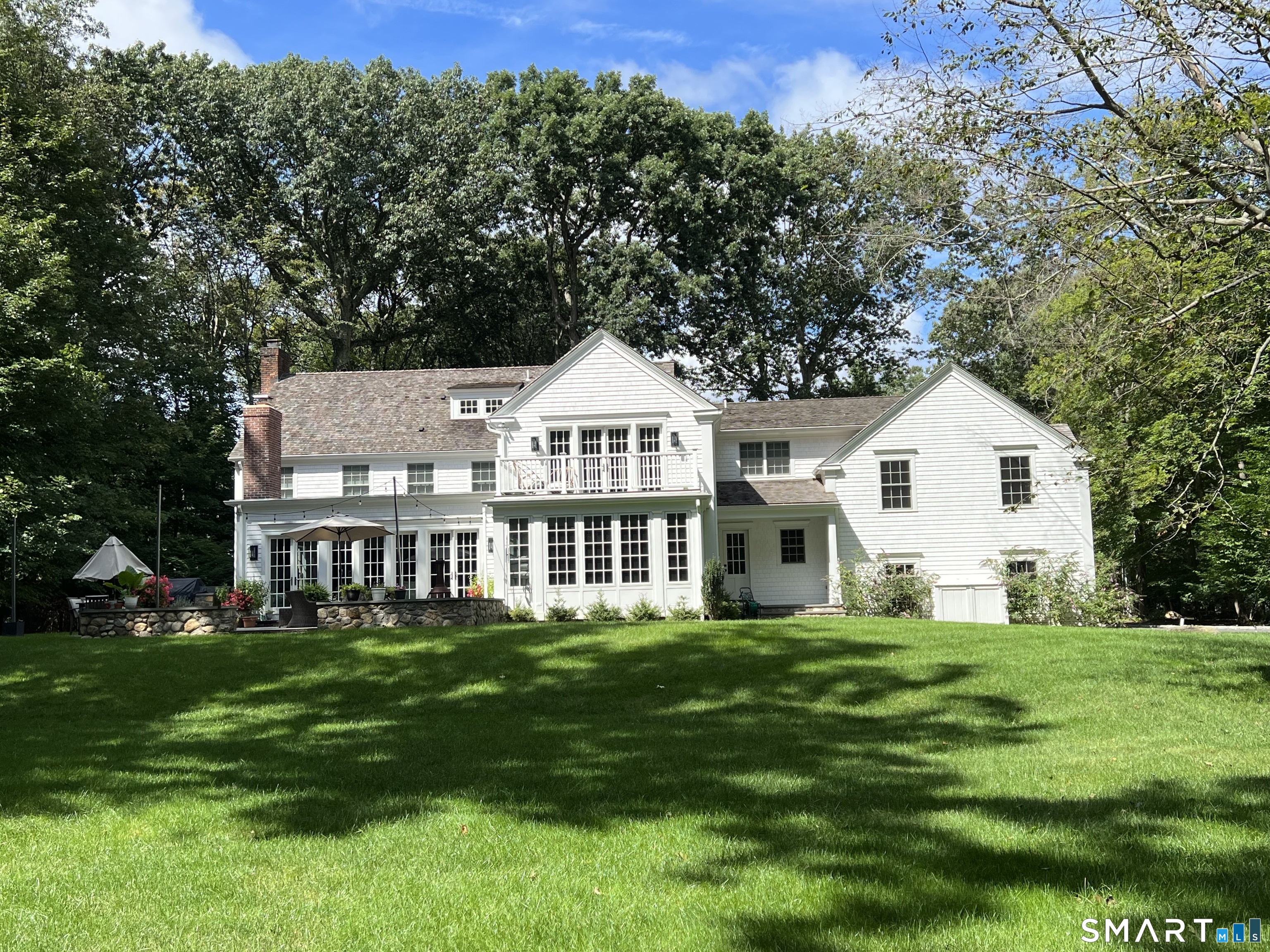 15 Marianne Road Darien, CT 06820 - Photo 36 of 36 a front view of a house with a garden