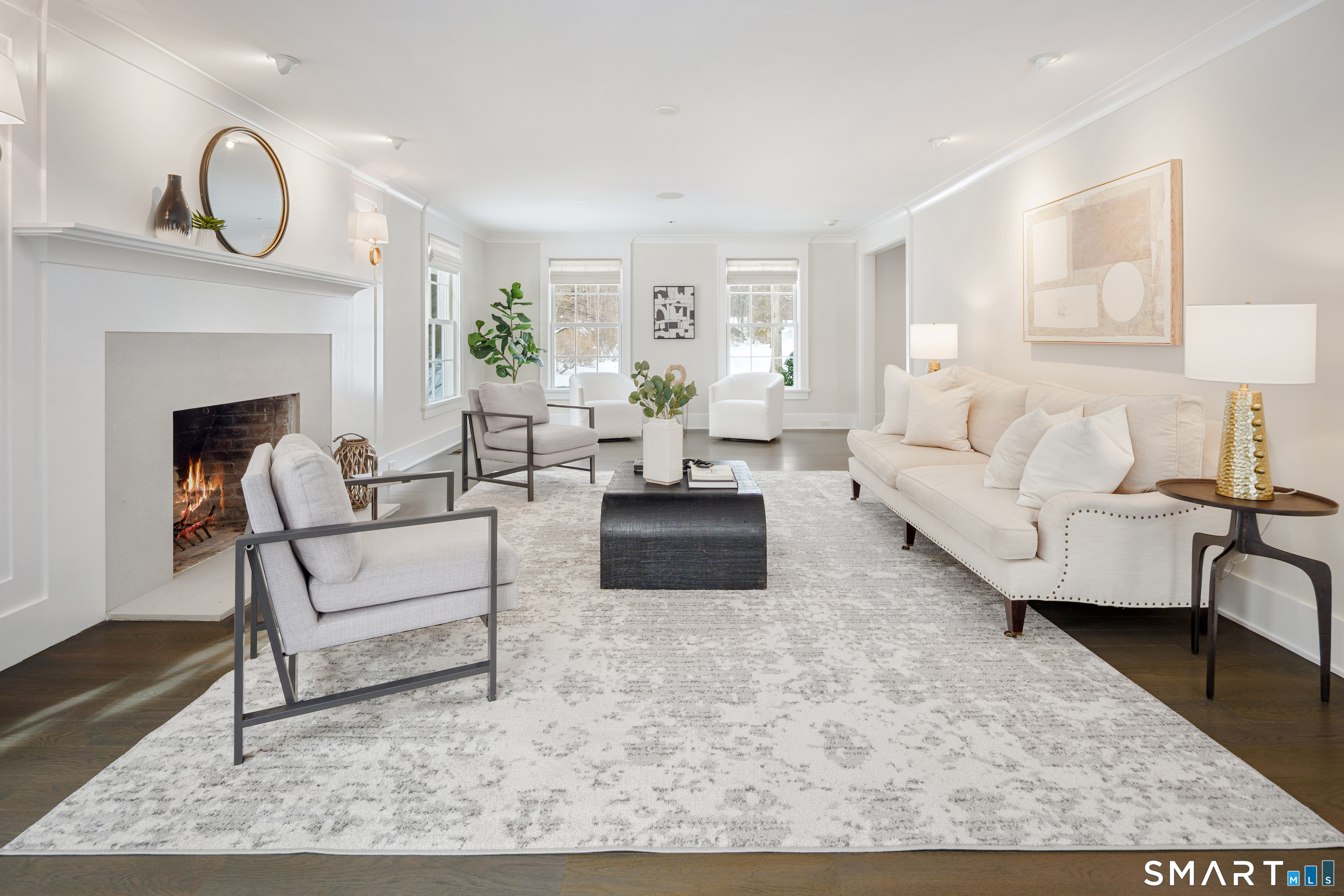 15 Marianne Road Darien, CT 06820 - Photo 5 of 36 a living room with furniture a rug and a fireplace