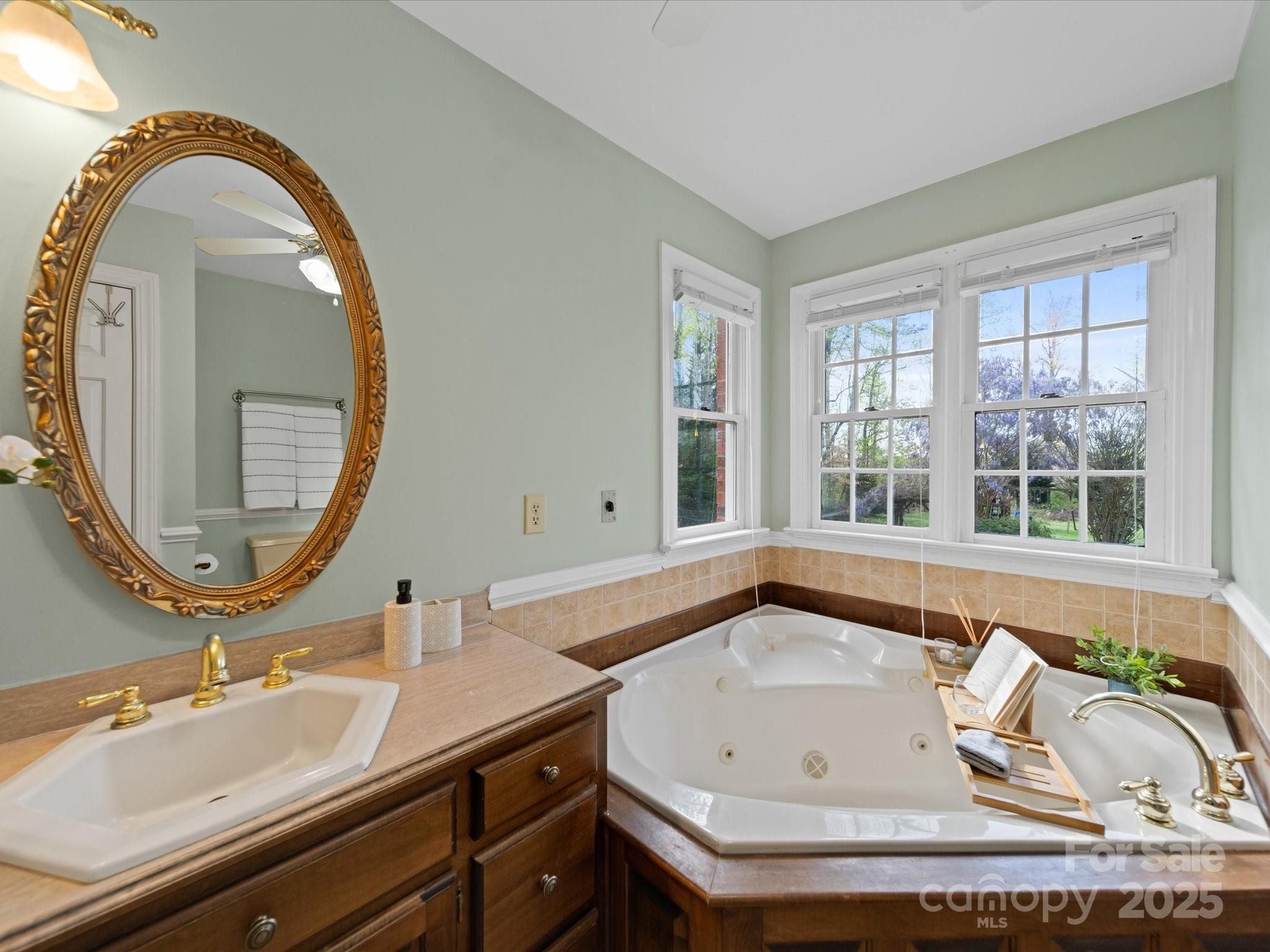 106 Berea Baptist Church Road Stanfield, NC 28163 - Photo 29 of 48 a bathroom with a sink and a mirror