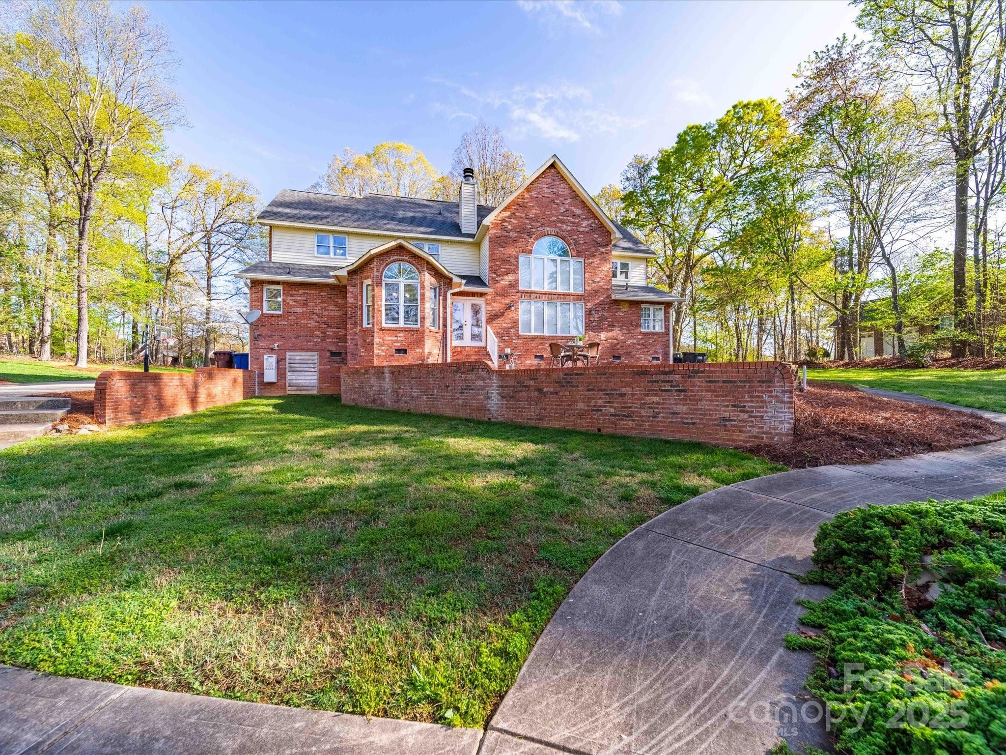 106 Berea Baptist Church Road Stanfield, NC 28163 - Photo 3 of 48 a front view of a house with garden