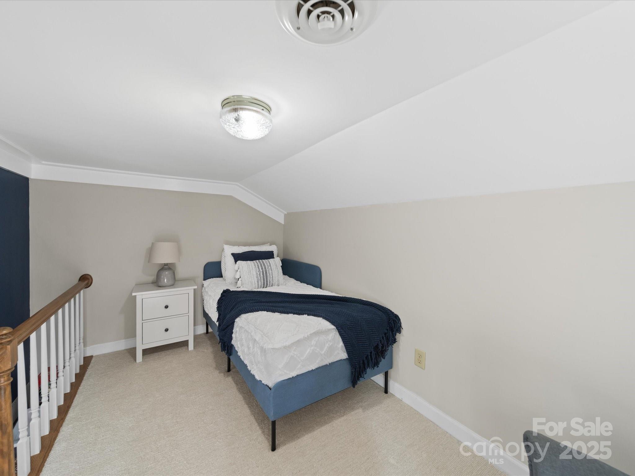 106 Berea Baptist Church Road Stanfield, NC 28163 - Photo 34 of 48 a bedroom with a bed and white doors