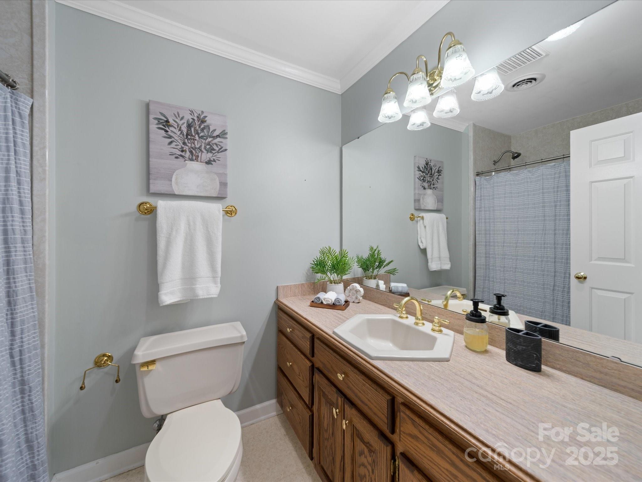 106 Berea Baptist Church Road Stanfield, NC 28163 - Photo 41 of 48 a bathroom with a granite countertop sink mirror and toilet