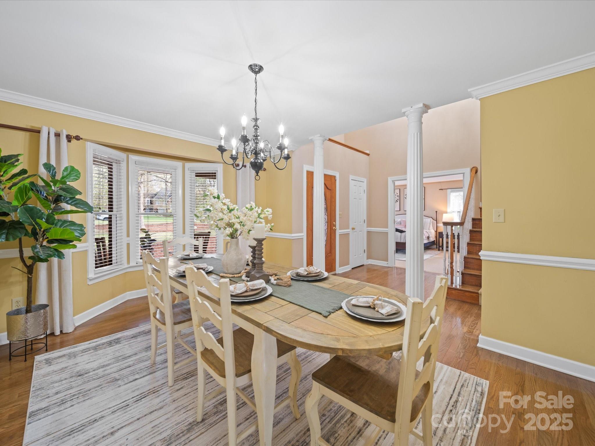 106 Berea Baptist Church Road Stanfield, NC 28163 - Photo 7 of 48 a view of a dining room with furniture window and wooden floor