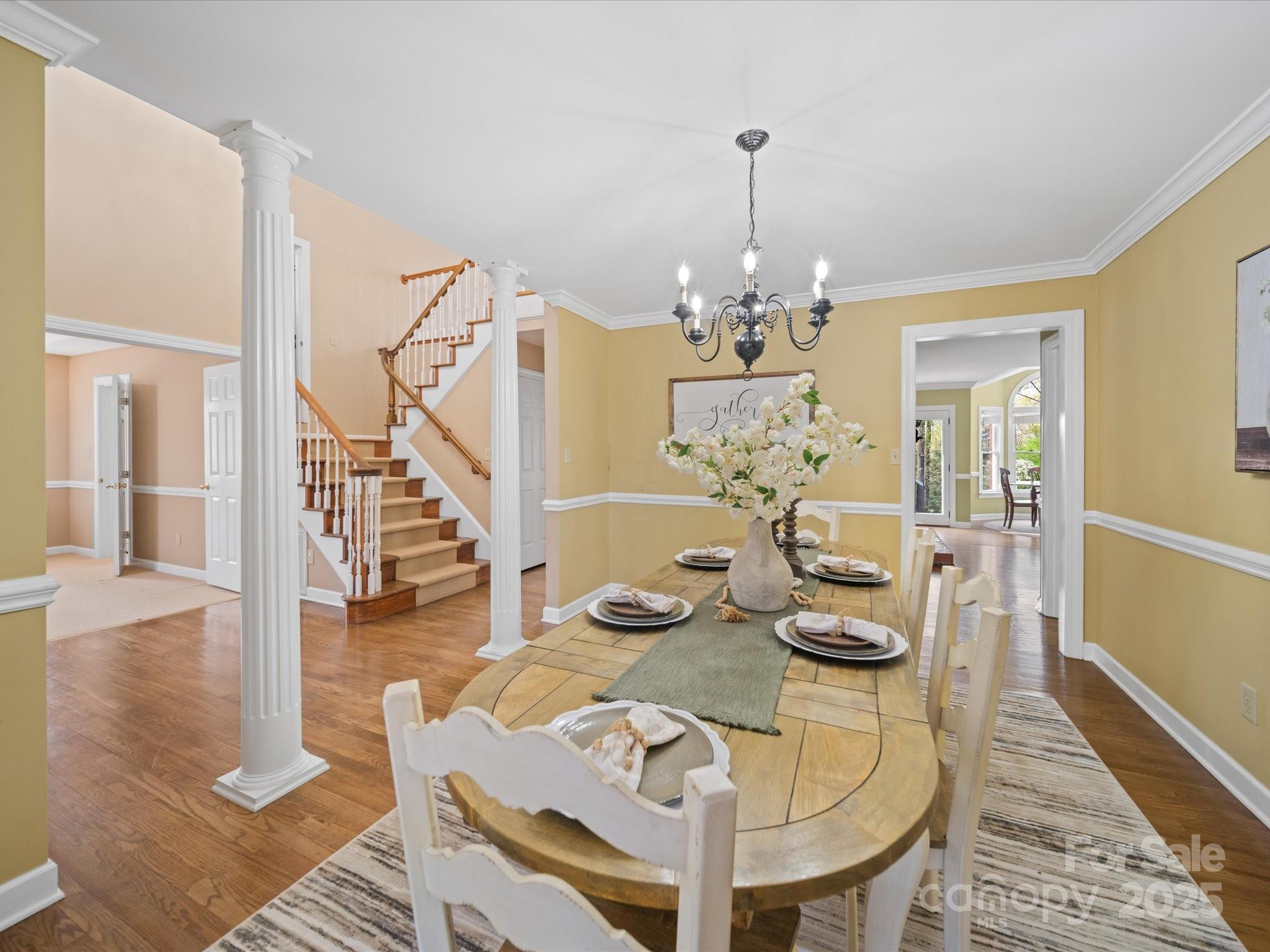 106 Berea Baptist Church Road Stanfield, NC 28163 - Photo 8 of 48 a view of a dining room with furniture and wooden floor