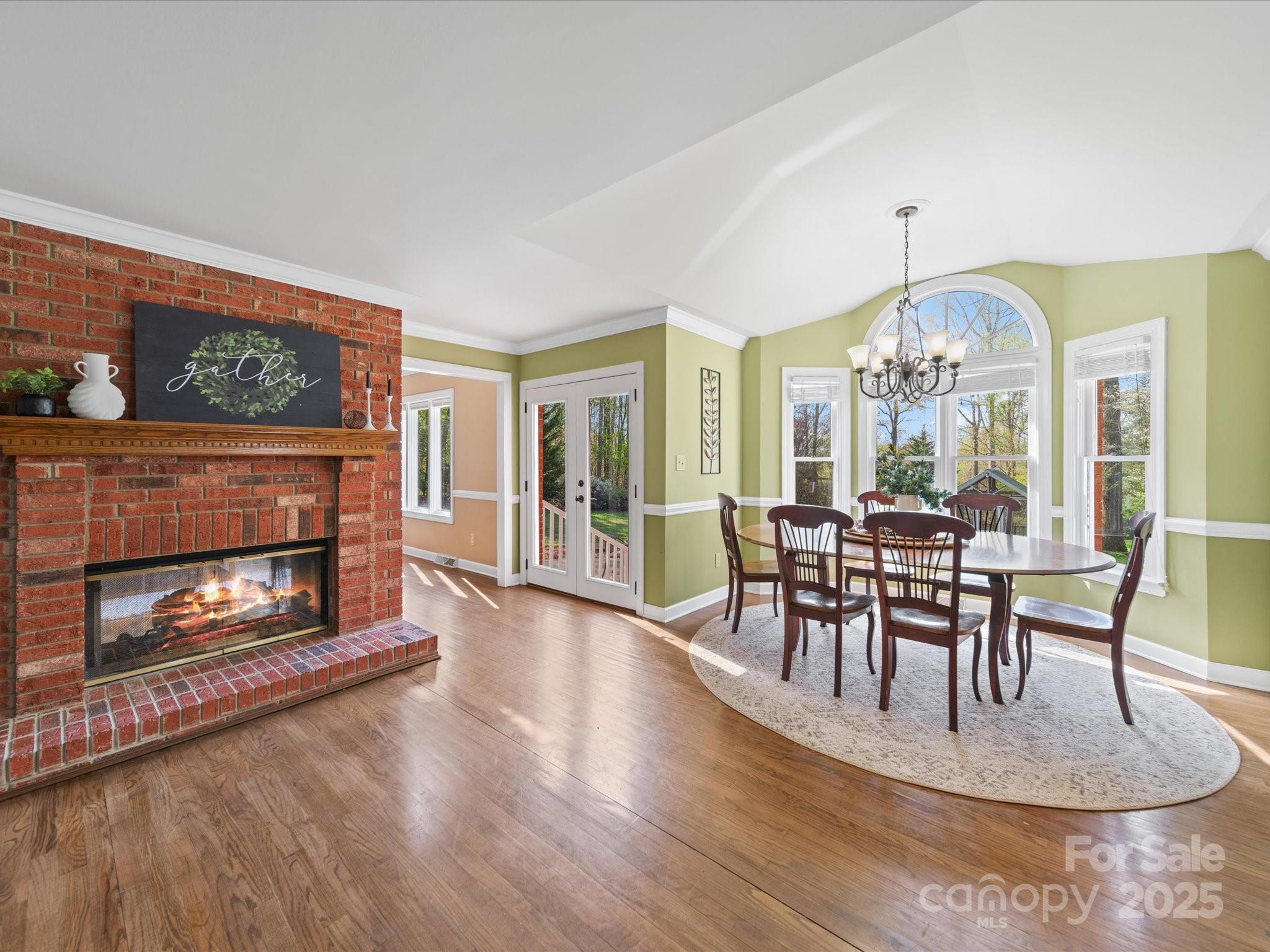 106 Berea Baptist Church Road Stanfield, NC 28163 - Photo 10 of 48 a view of a dining room with furniture window and wooden floor
