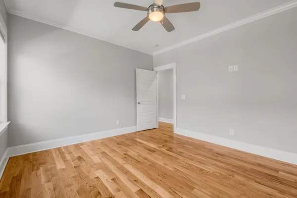 a view of a balcony with wooden floor