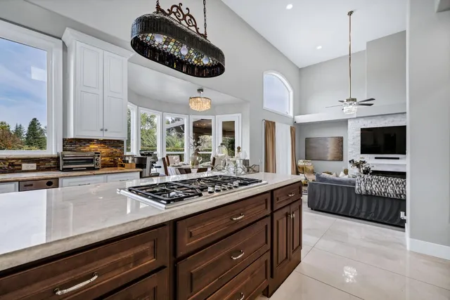 a view of a house with a yard porch and sitting area