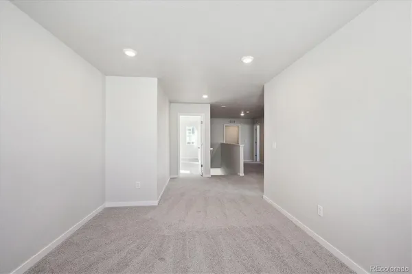 a view of a big room with a hallway