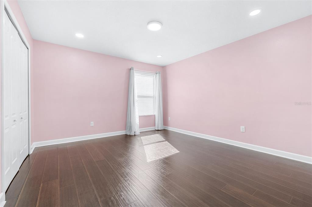 1762 Hadden Hall Place Trinity, FL 34655 - Photo 30 of 49 a view of an empty room with wooden floor