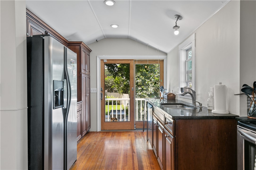 30 Fenner Avenue Newport, RI 02840 - Photo 12 of 25 Kitchen Opening Up to Sunny Back Yard