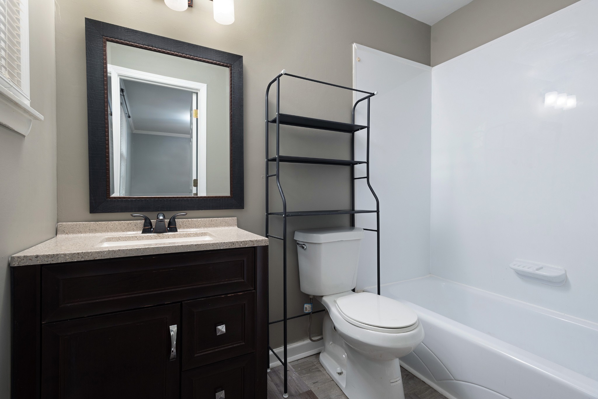 511 North Pawnee Drive Springfield, TN 37172 - Photo 12 of 34 a bathroom with a toilet sink and mirror