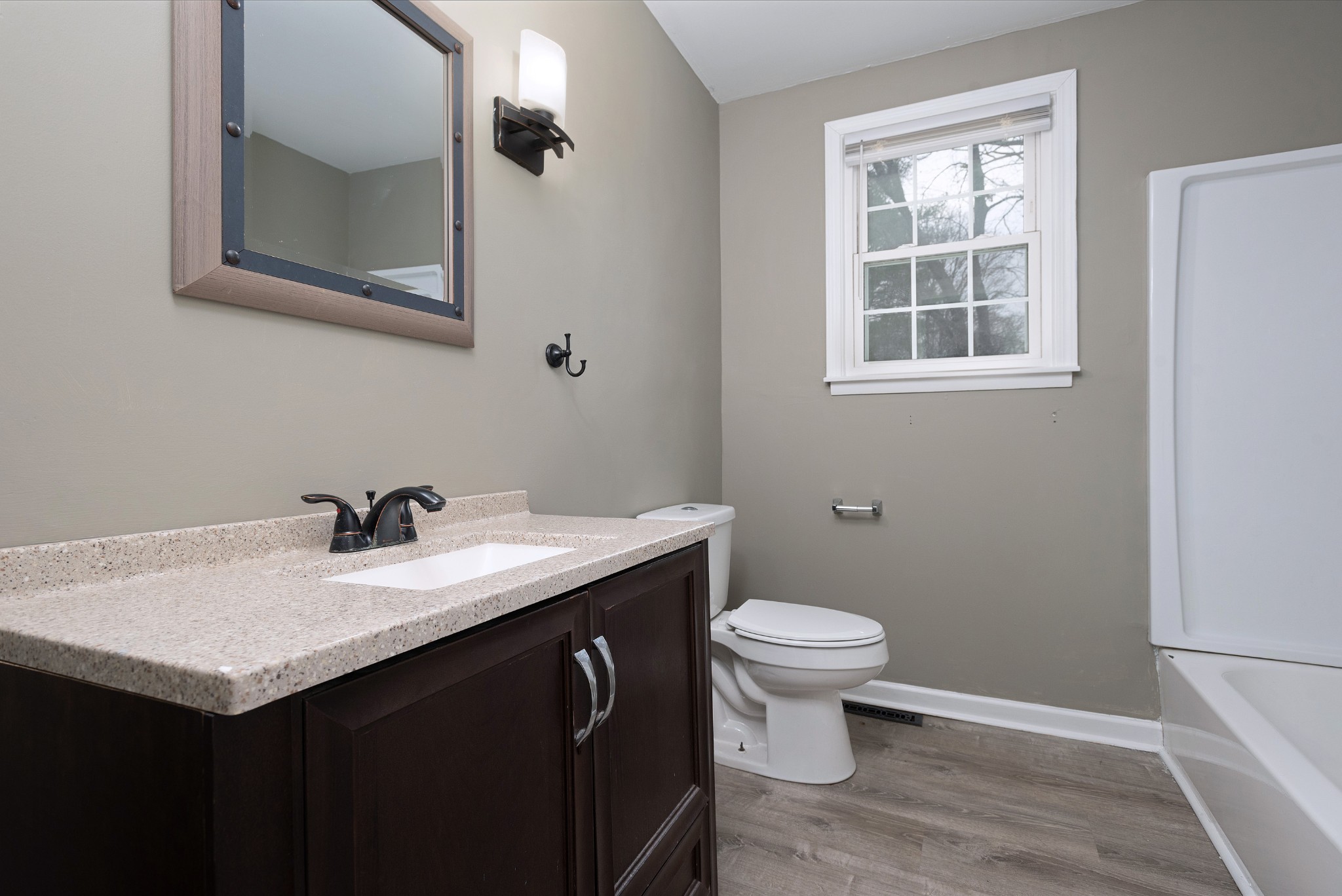511 North Pawnee Drive Springfield, TN 37172 - Photo 15 of 34 a bathroom with a sink and a toilet