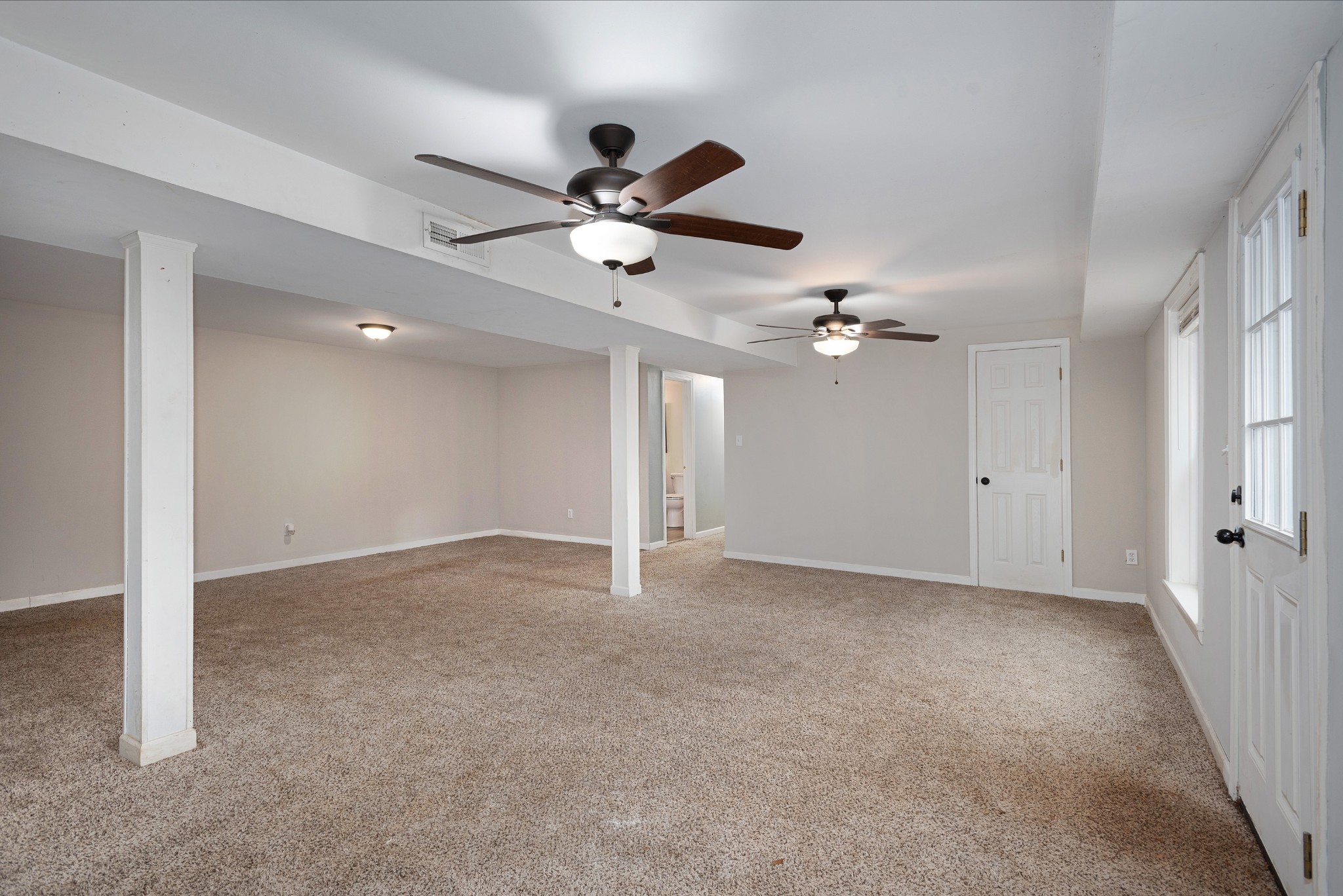 511 North Pawnee Drive Springfield, TN 37172 - Photo 18 of 34 an empty room with ceiling fan and window