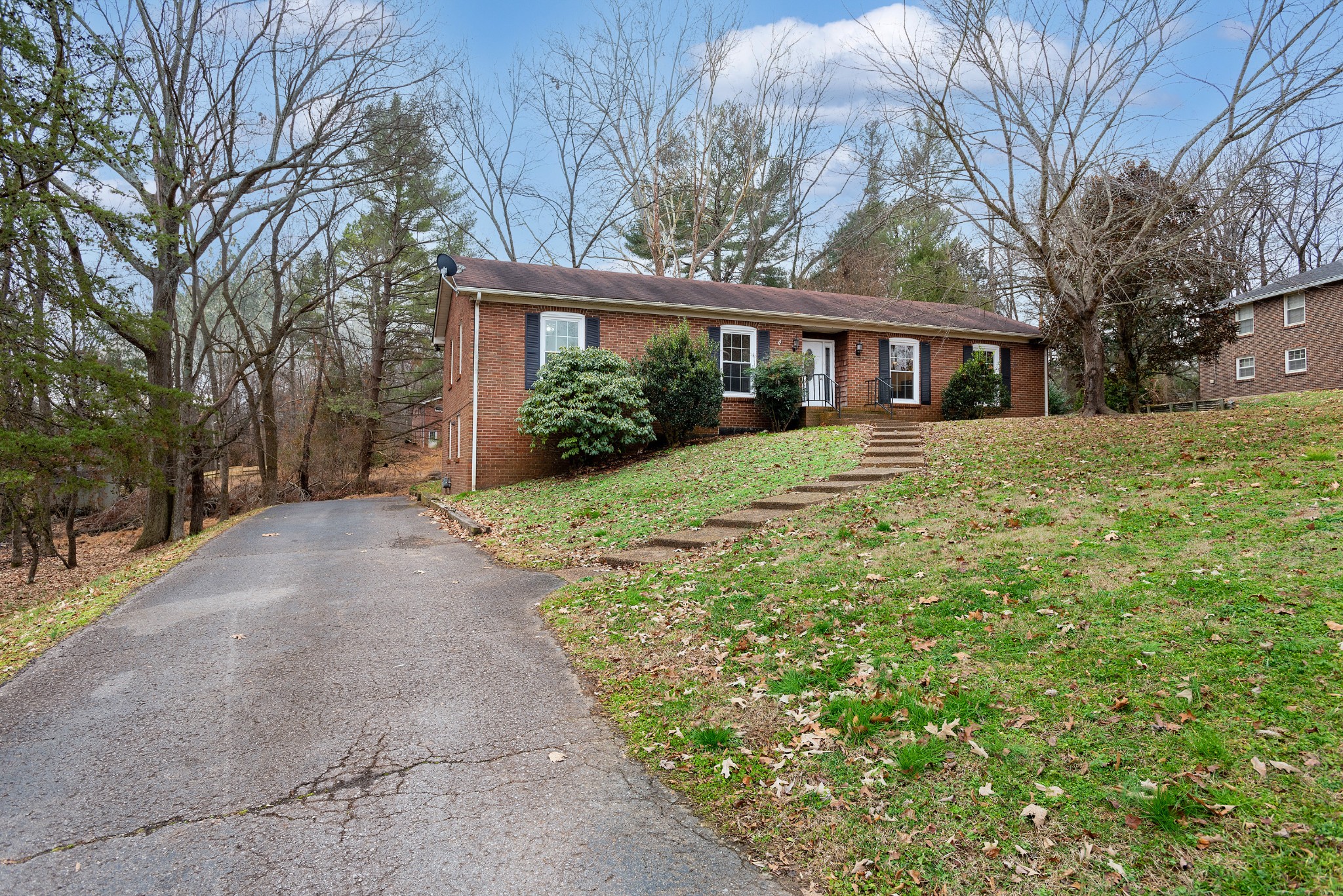 511 North Pawnee Drive Springfield, TN 37172 - Photo 27 of 34 a front view of a house with a yard and trees