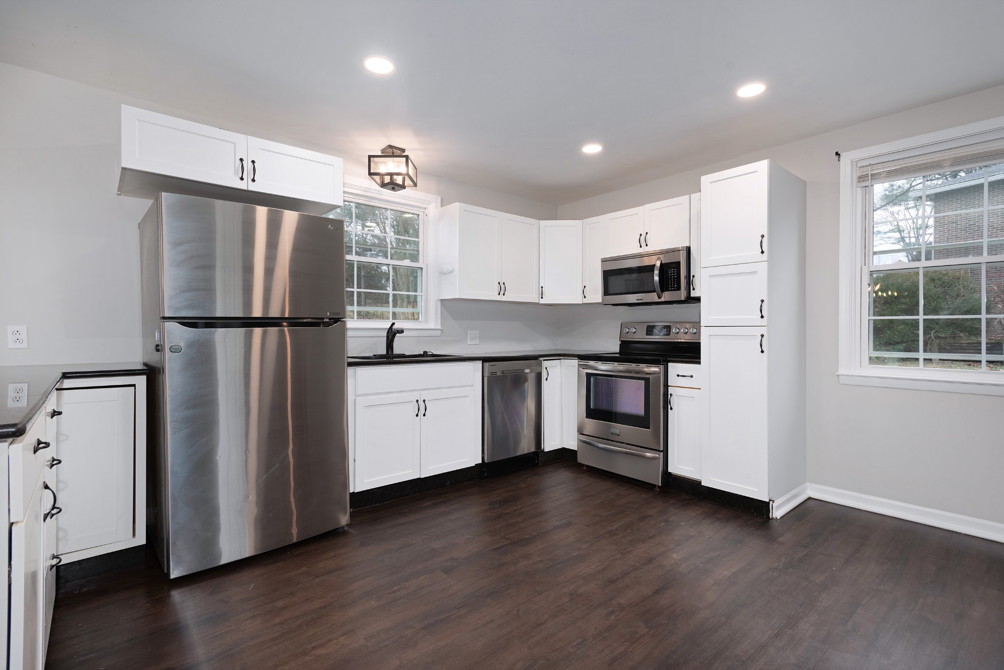 511 North Pawnee Drive Springfield, TN 37172 - Photo 3 of 34 a kitchen with stainless steel appliances a refrigerator and a stove top oven