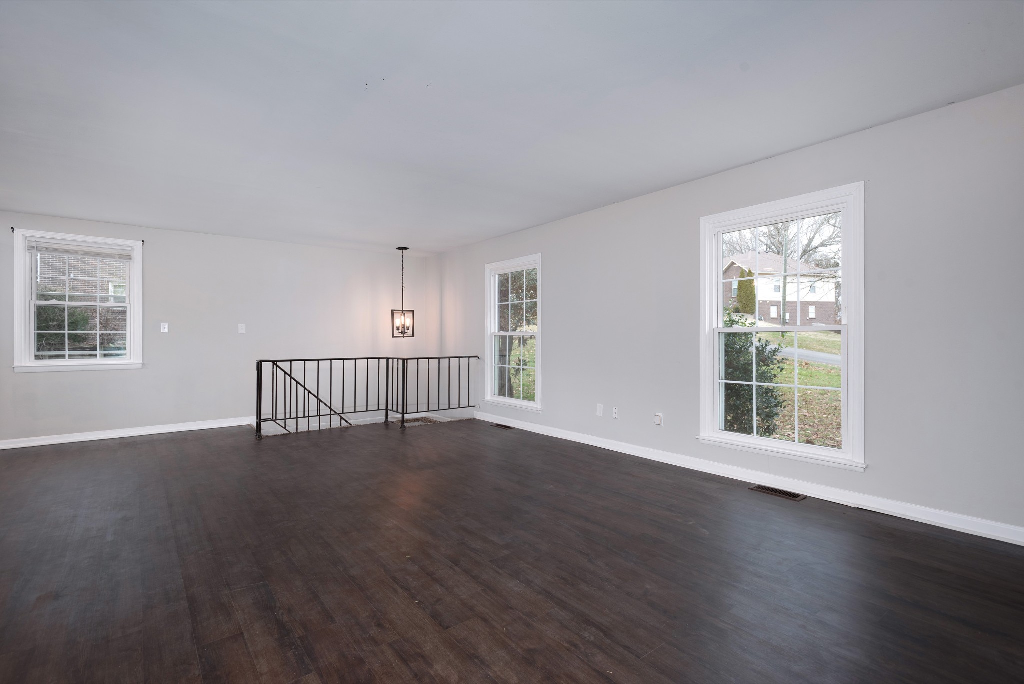 511 North Pawnee Drive Springfield, TN 37172 - Photo 7 of 34 a view of an empty room with wooden floor and a window