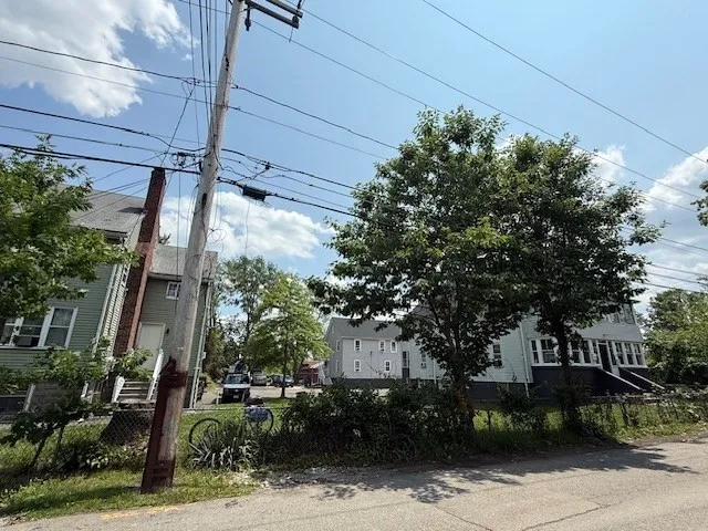 a backyard of a house with lots of green space
