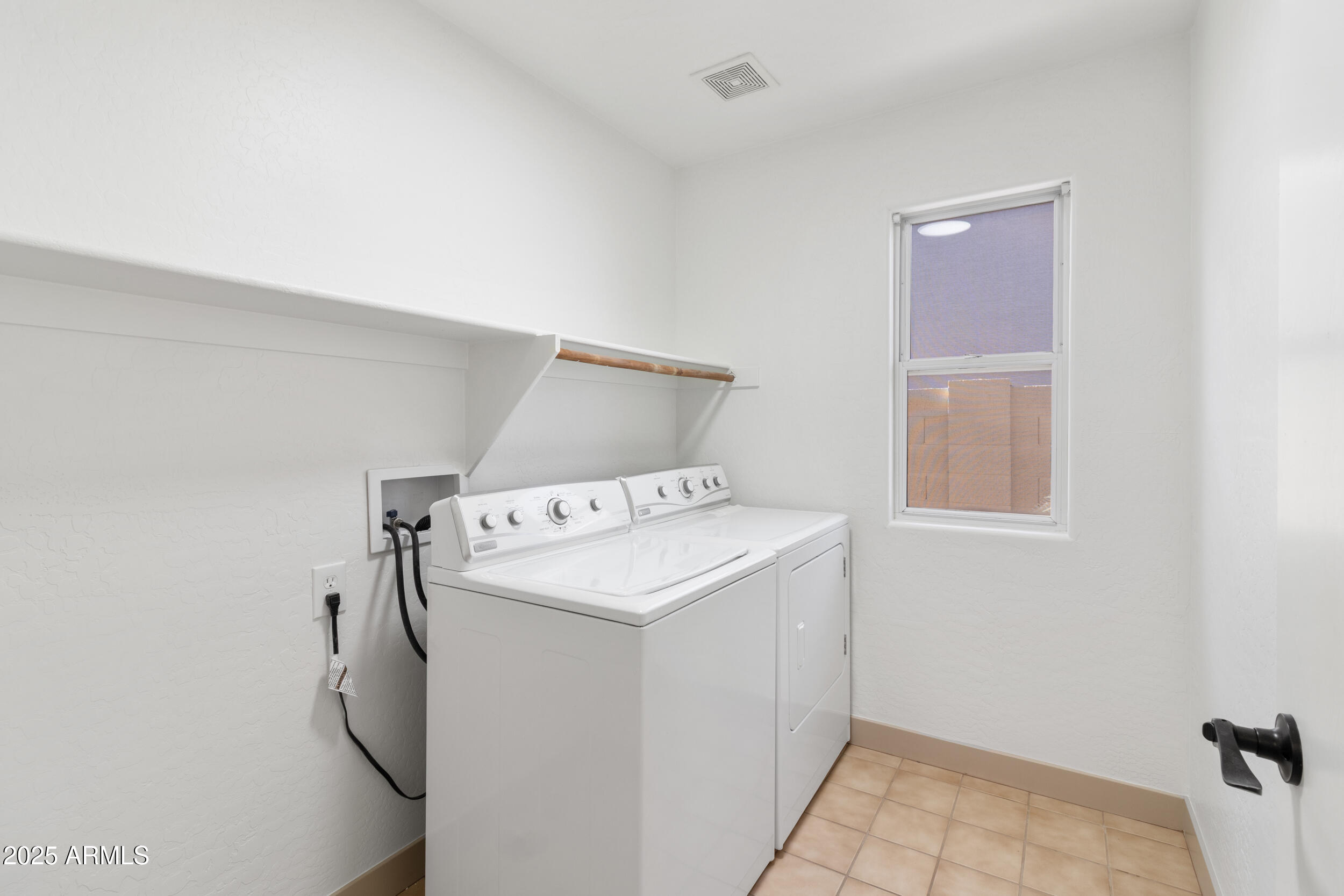 16329 West Rimrock Street Surprise, AZ 85388 - Photo 15 of 31 a utility room with dryer and washer