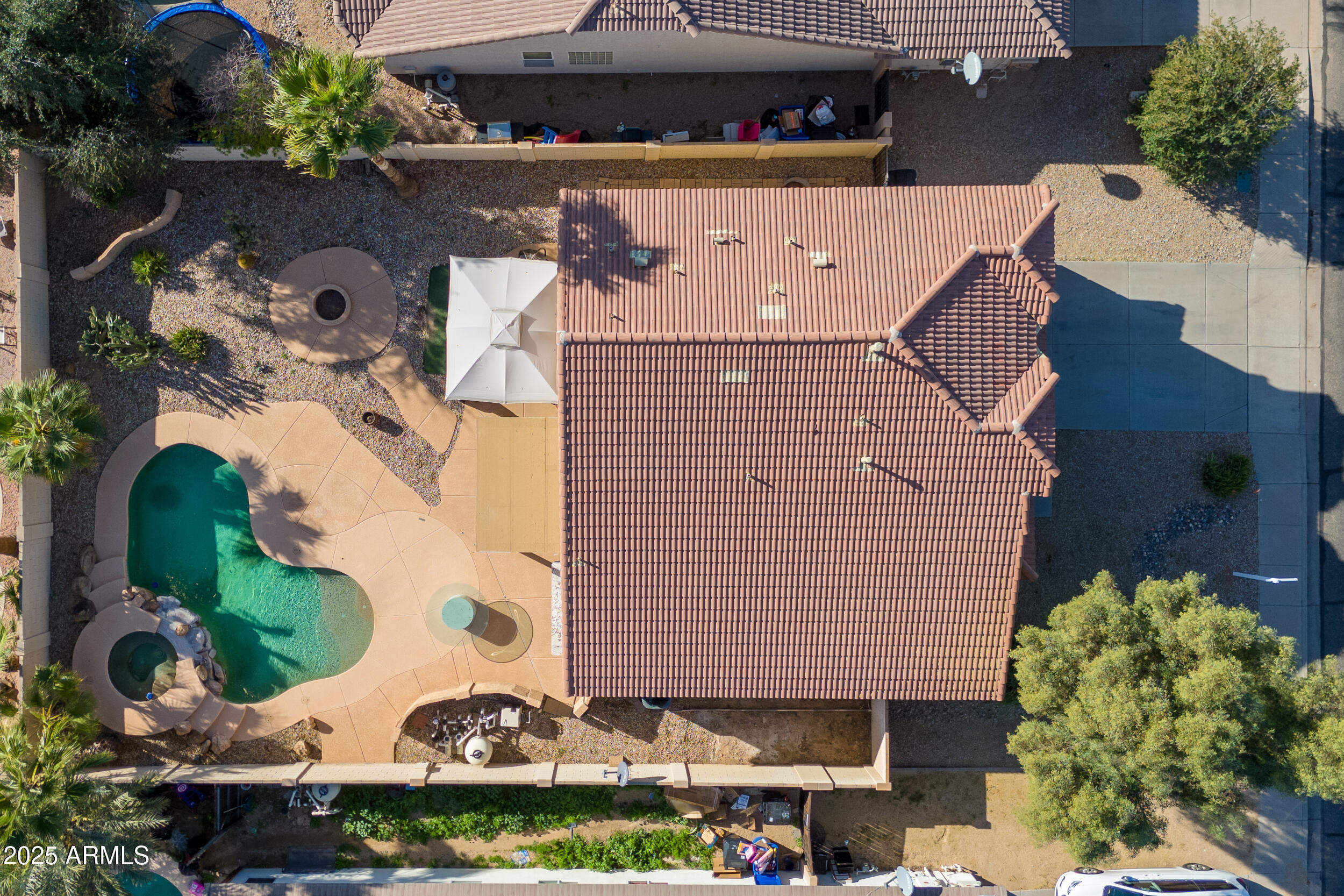 16329 West Rimrock Street Surprise, AZ 85388 - Photo 31 of 31 an aerial view of a house with a swimming pool