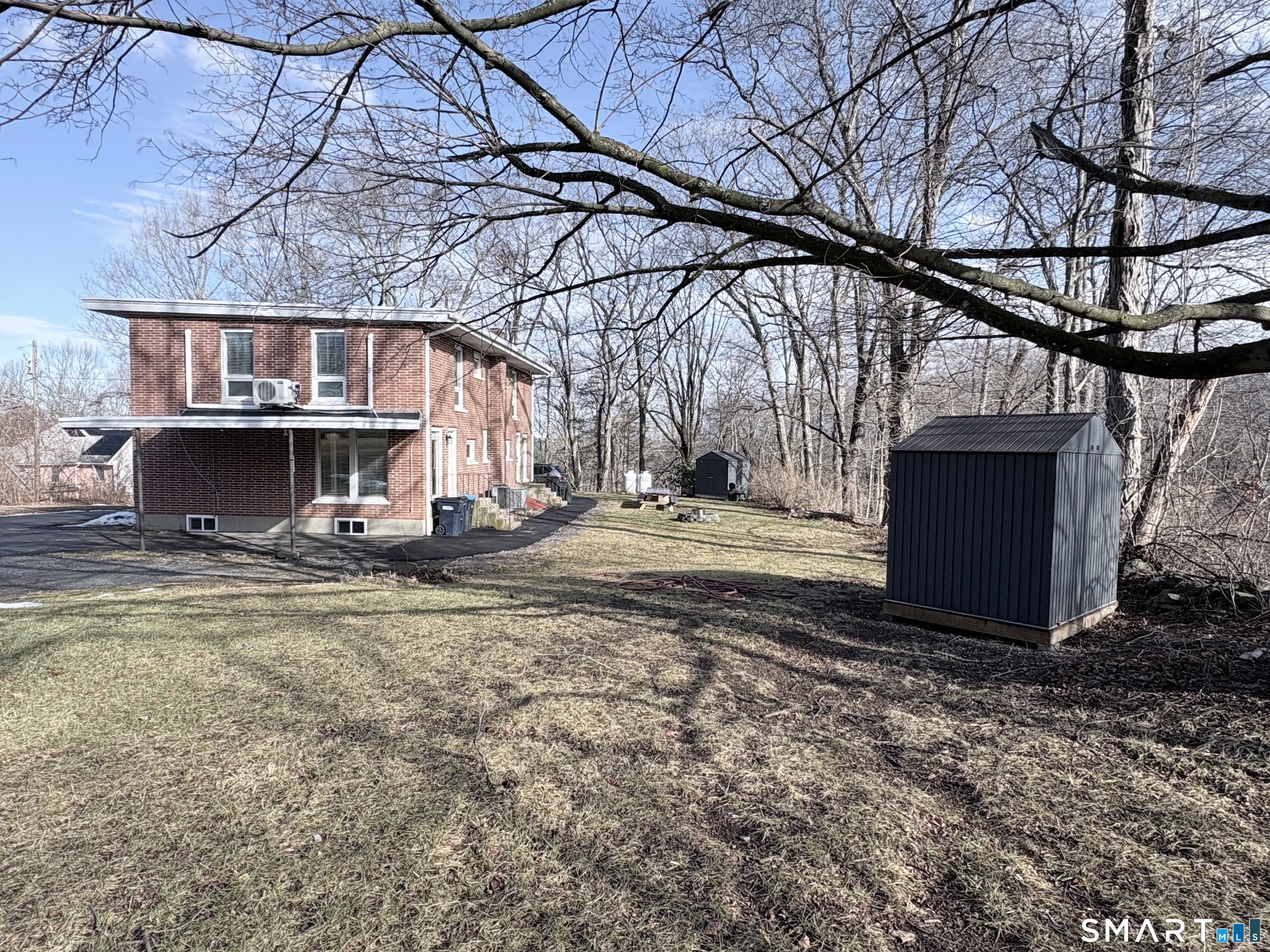 80 A Balaban Road, Unit A/ON Colchester, CT 06415 - Photo 4 of 24 a view of a yard with a house