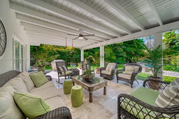 a outdoor living space with furniture and garden view