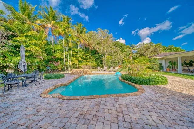 a view of outdoor space yard and swimming pool