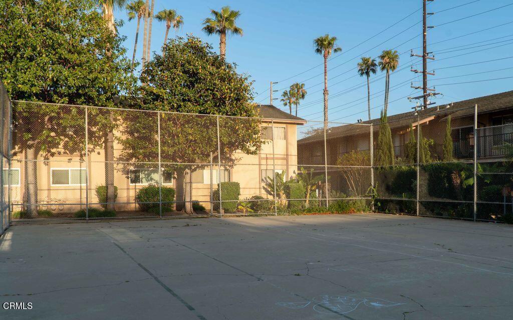 1925 Ginger Street, Unit 104 Oxnard, CA 93036 - Photo 15 of 25 a view of a house with a yard