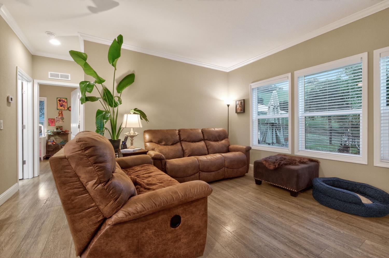 7570 Airola Road Vallecito, CA 95251 - Photo 60 of 90 a living room with furniture and a wooden floor
