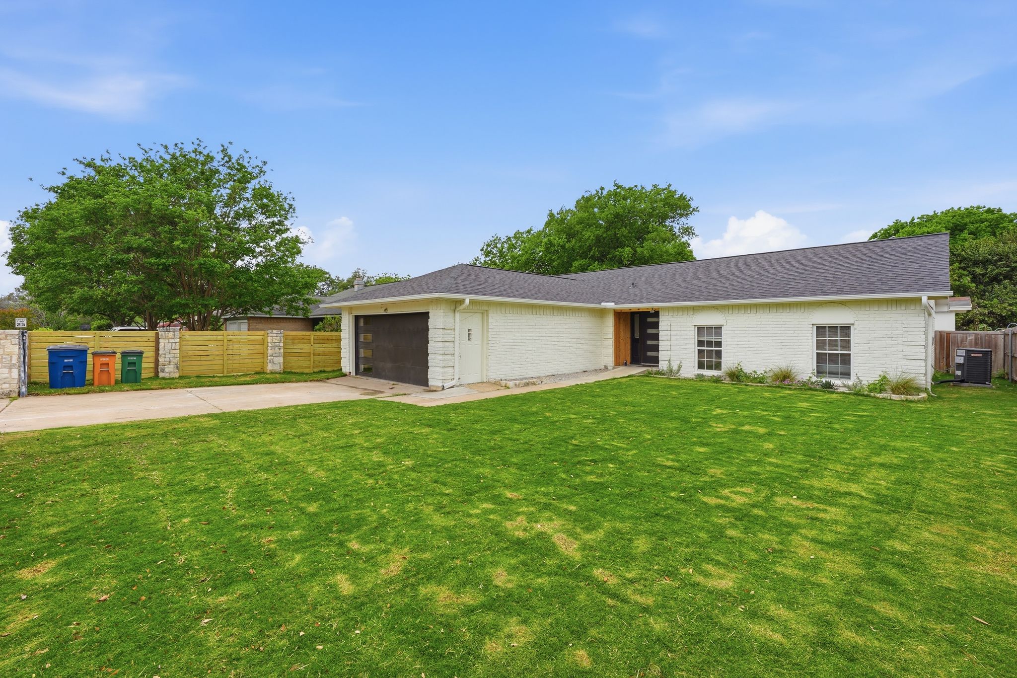 6804 Meadow Run Austin, TX 78745 - Photo 4 of 34 a view of a house with a back yard