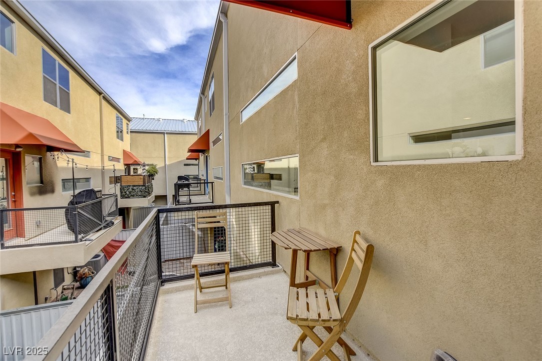 1998 Lewis Avenue Las Vegas, NV 89101 - Photo 20 of 48 A spacious balcony invites outdoor moments—whether you're hosting, lounging, or soaking in the view.
