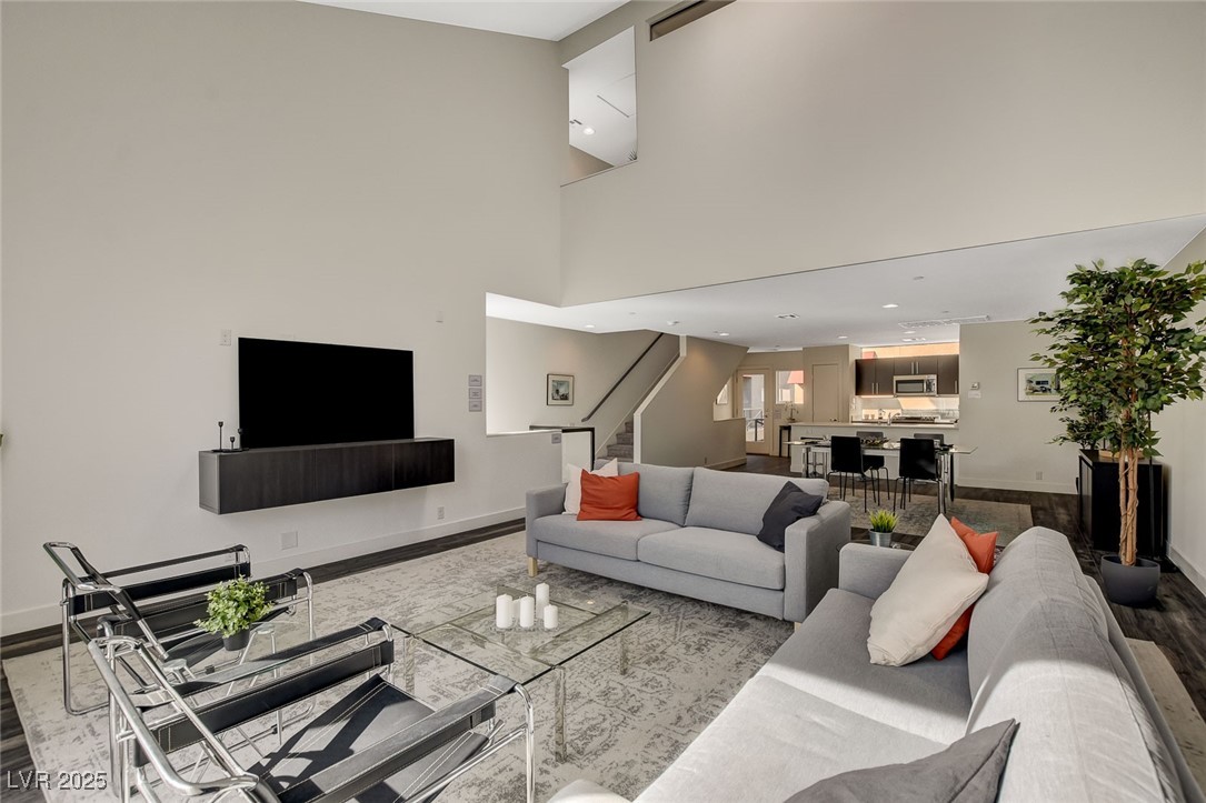 1998 Lewis Avenue Las Vegas, NV 89101 - Photo 21 of 48 High ceilings and natural light work together to create a comfortable, uplifting environment in this stylish living room!