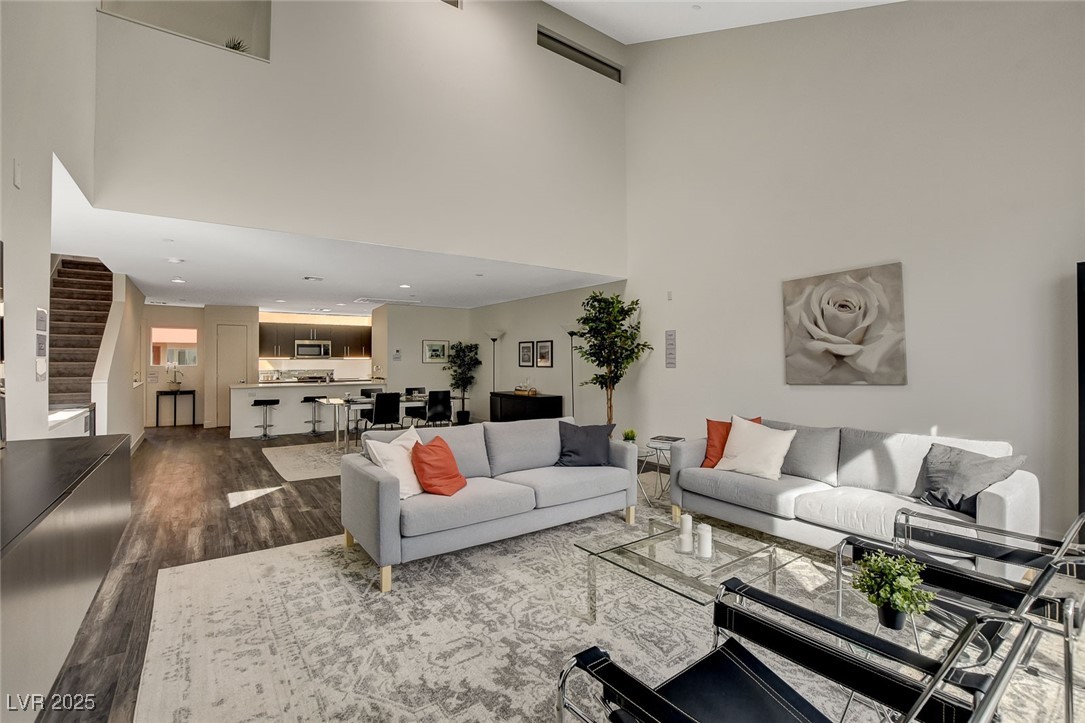 1998 Lewis Avenue Las Vegas, NV 89101 - Photo 22 of 48 With soaring ceilings and abundant natural light, this stylish living room feels both bright and serene.
