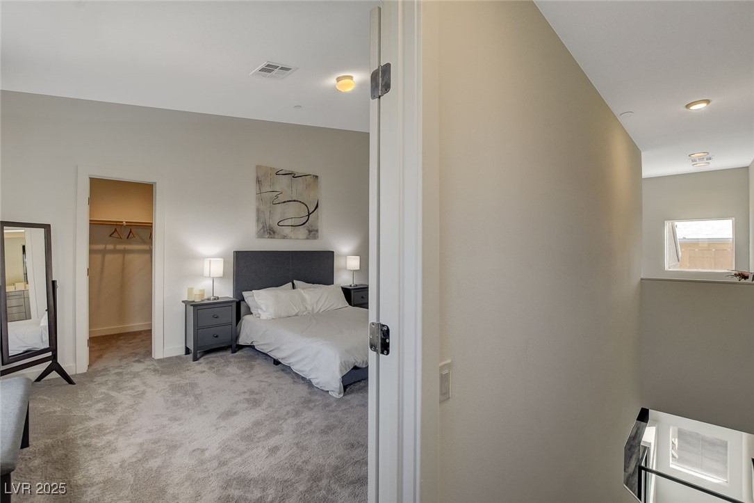 1998 Lewis Avenue Las Vegas, NV 89101 - Photo 28 of 48 Enjoy the comfort of a dual-sink ensuite and walk-in shower in this thoughtfully designed primary suite.