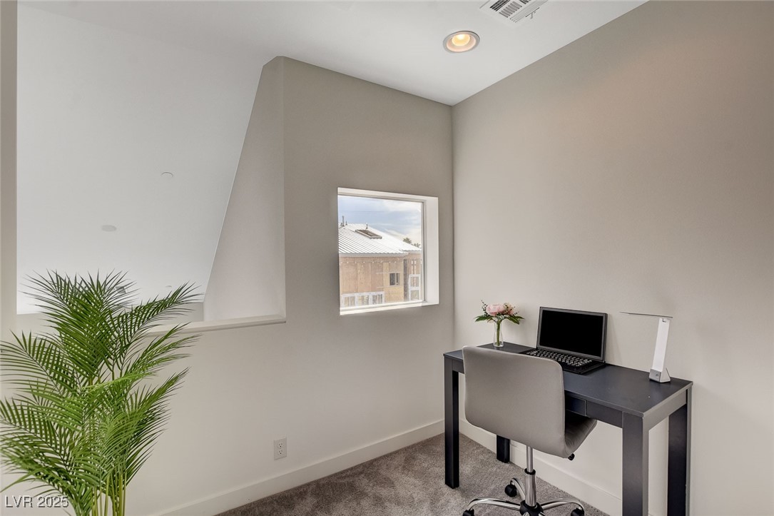 1998 Lewis Avenue Las Vegas, NV 89101 - Photo 35 of 48 Bonus space features a window and a cutout that opens to the living room — perfect for work or quiet time.