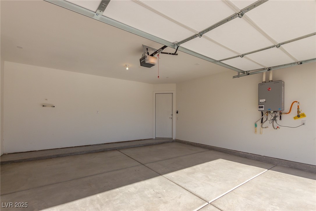 1998 Lewis Avenue Las Vegas, NV 89101 - Photo 41 of 48 A spacious 2-car garage with modern perks like a tankless water heater and water softener plumbing.