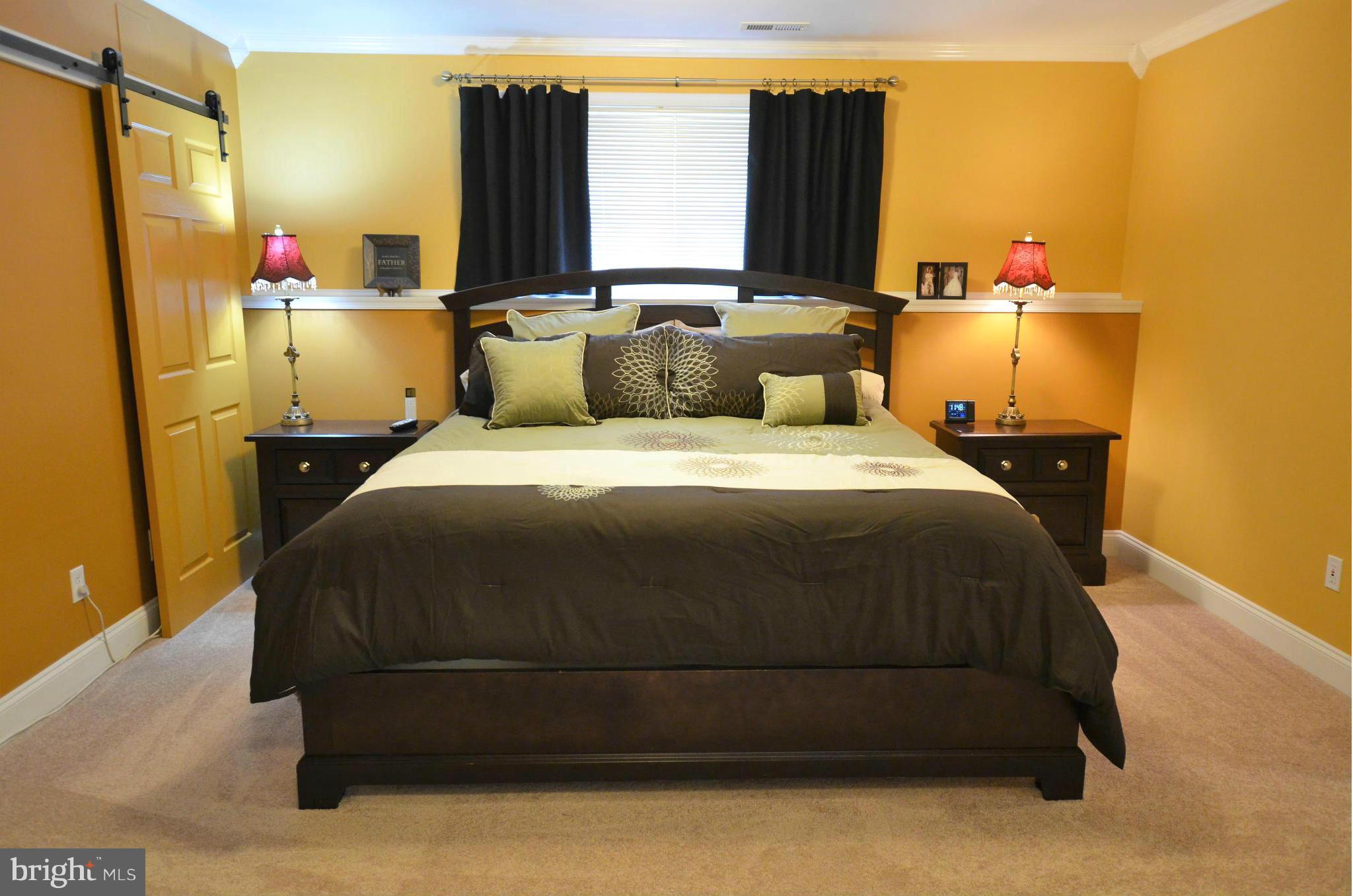 7805 Locust Wood Road Severn, MD 21144 - Photo 18 of 29 2nd MASTER is huge! Shown with King bed