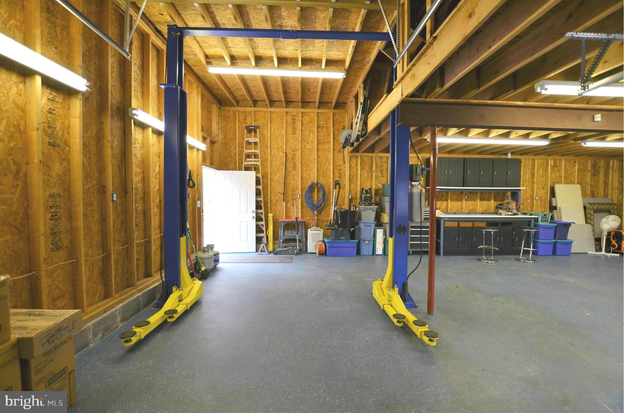 7805 Locust Wood Road Severn, MD 21144 - Photo 3 of 29 4-ton Lift conveys! Separate 220 elec service