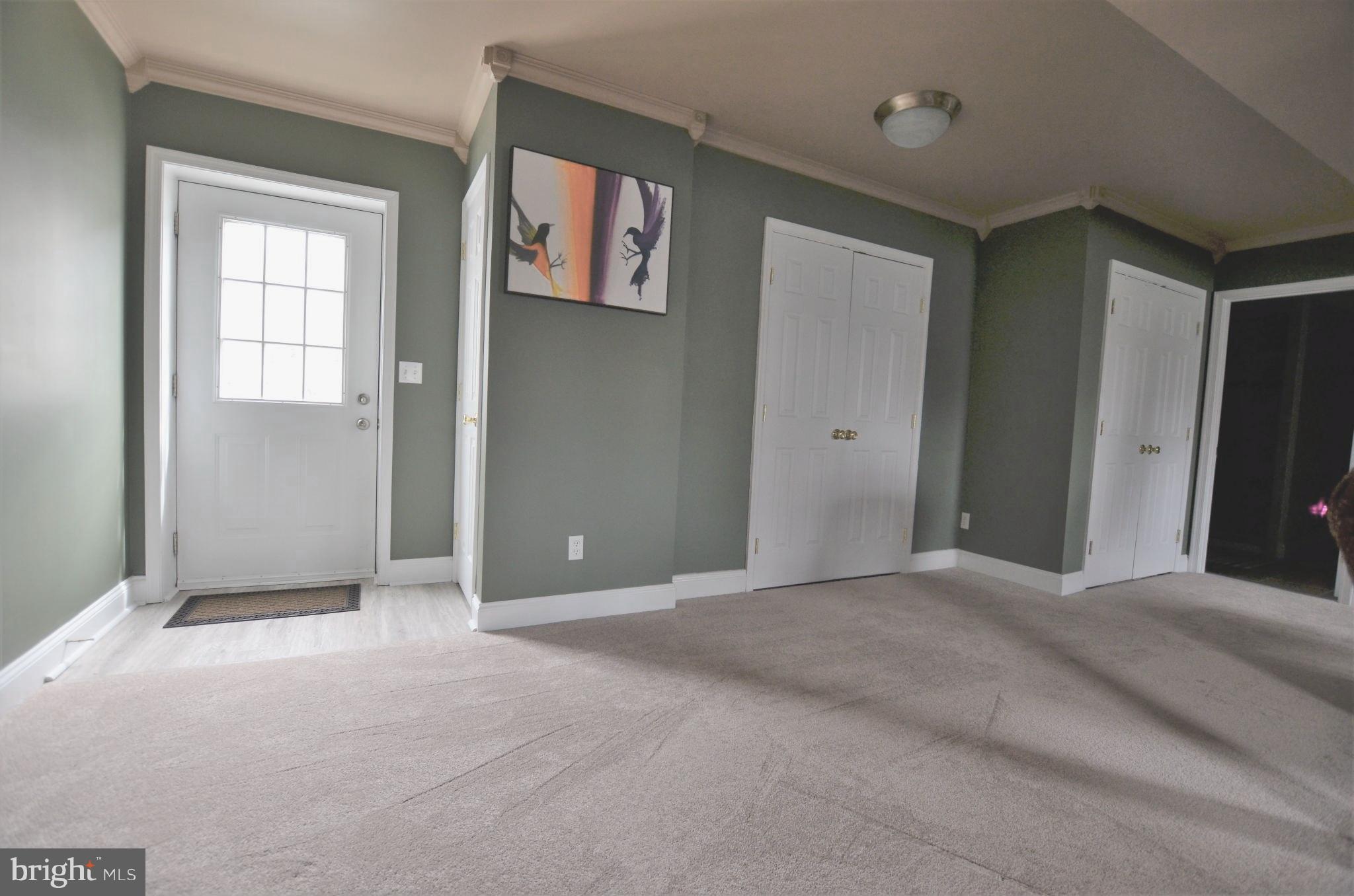 7805 Locust Wood Road Severn, MD 21144 - Photo 25 of 29 Space to entertain that flows out to backyard fun!