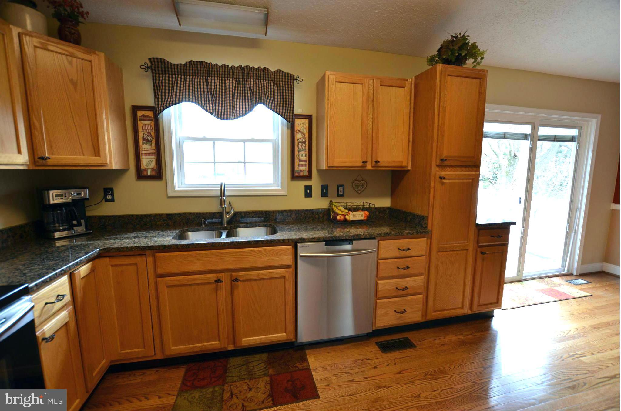 7805 Locust Wood Road Severn, MD 21144 - Photo 7 of 29 Good light, custom cabinetry, granite tops, SS!