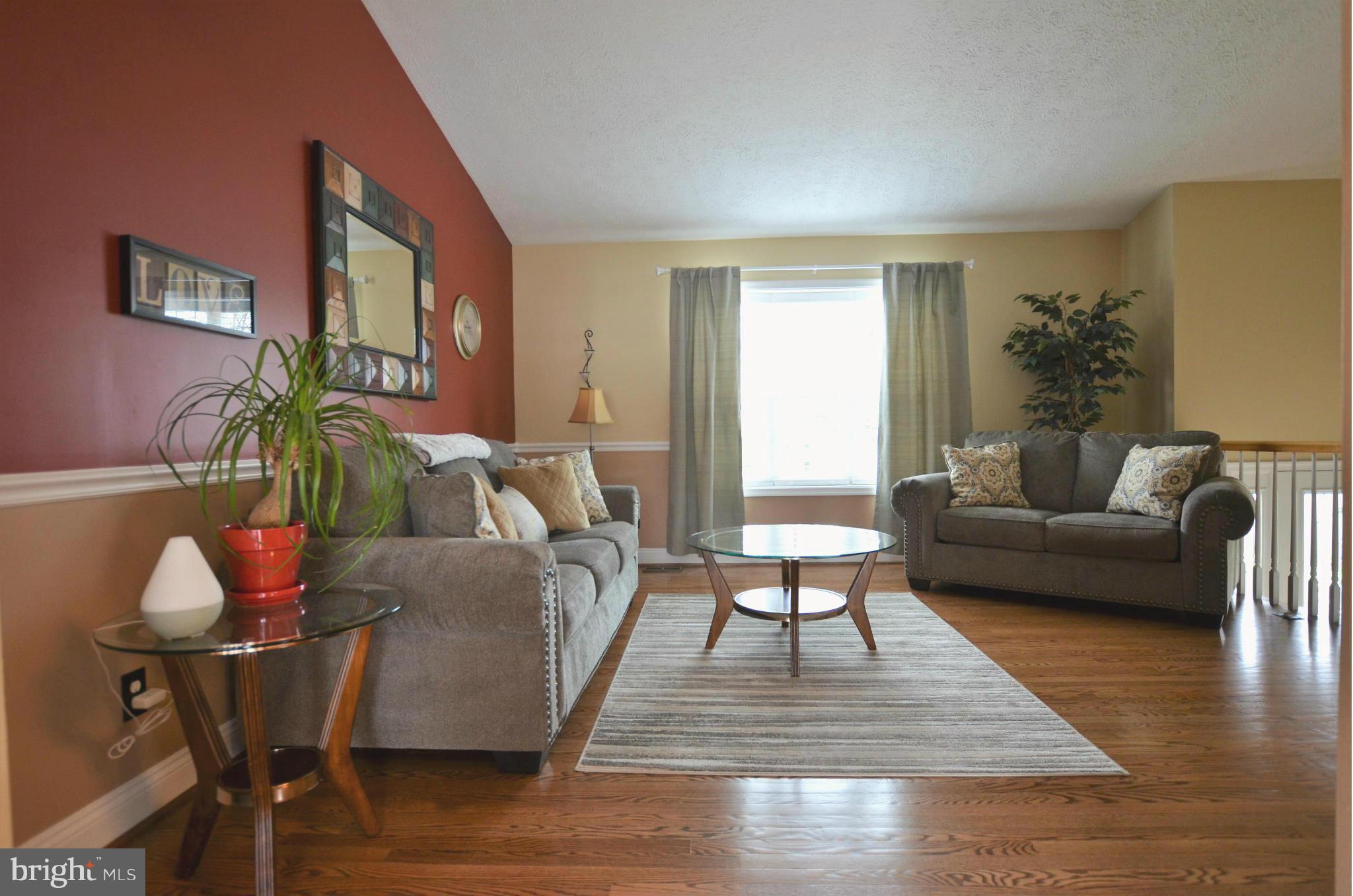 7805 Locust Wood Road Severn, MD 21144 - Photo 9 of 29 Open, airy Living Room with vaulted ceiling