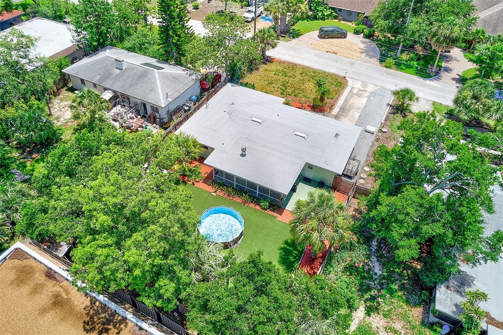 14079 Victoria Road Largo, FL 33774 - Photo 3 of 46 an aerial view of a house with yard