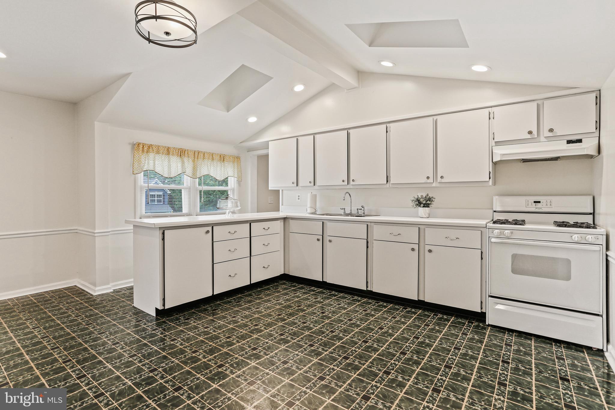 10686 Old Bond Mill Road Laurel, MD 20723 - Photo 4 of 40 Vaulted Ceiling in Kitchen